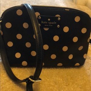 Super cute polka dot crossbody bag .